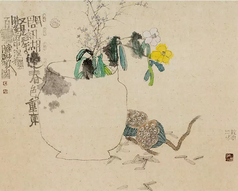 花瓶里插了几朵花 还有荷菱连胜群